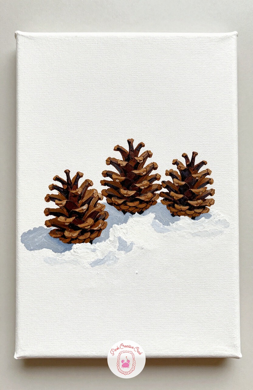Pinecone Trio On Snow — Three pinecones resting on a patch of snow give you a simple still life with built in texture. Christmas painting ideas