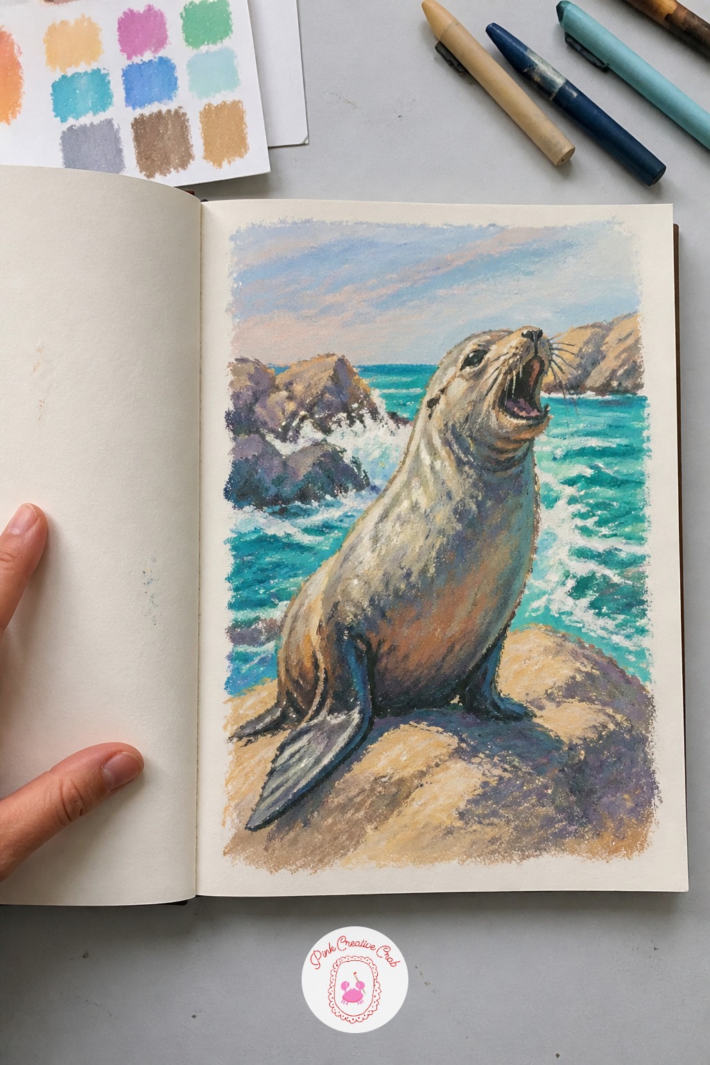 Sea Lion Barking On A Sunlit Rock — Try the ten-minute version first: a sea lion's rounded body on a simple grey rock, mouth open mid-bark, flat turquoise