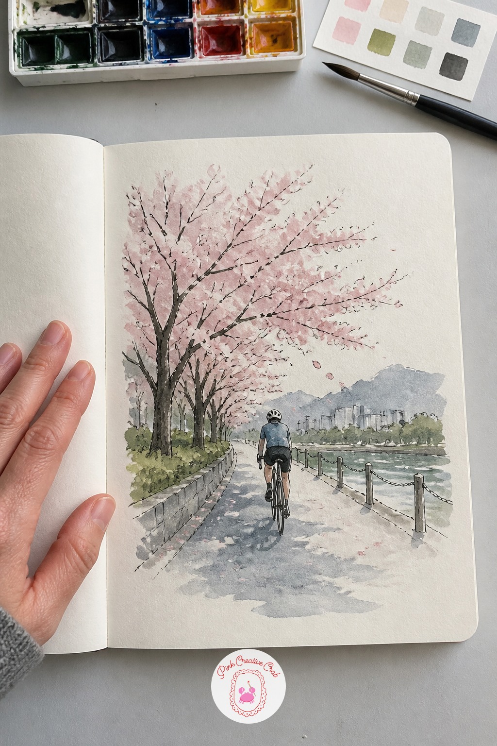 Cyclist Riding Past a Row of Cherry Trees — After all that careful stillness, let's move again. Japan sketchbook