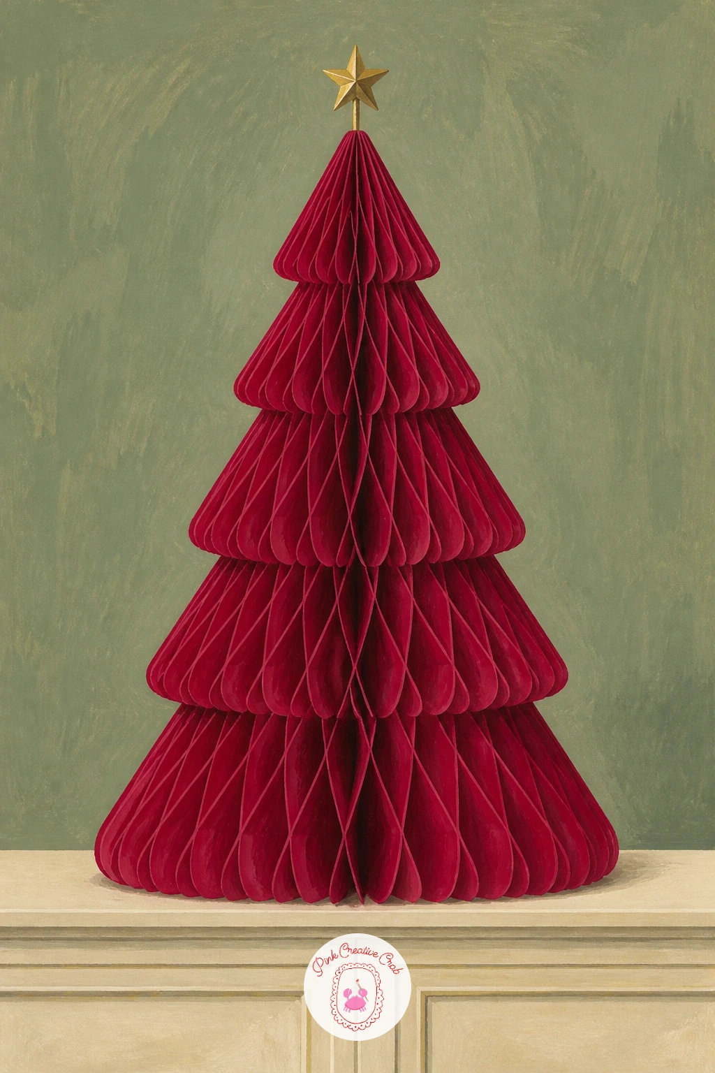 Honeycomb Paper Tree in Berry Red — Start the whole set with the honeycomb paper tree, the shape that is everywhere in store windows this year. Christmas decor