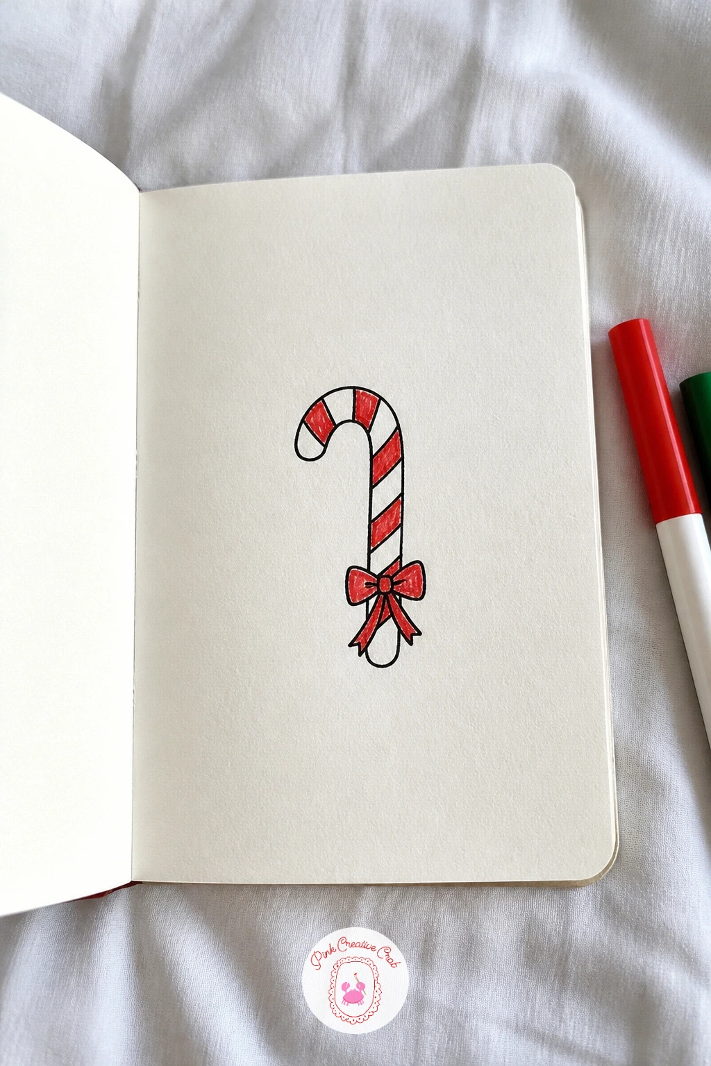 Candy Cane With A Bow — Build on that same ribbon shape with a candy cane with a bow, since the bow you just practiced slots right onto a new object. Christmas