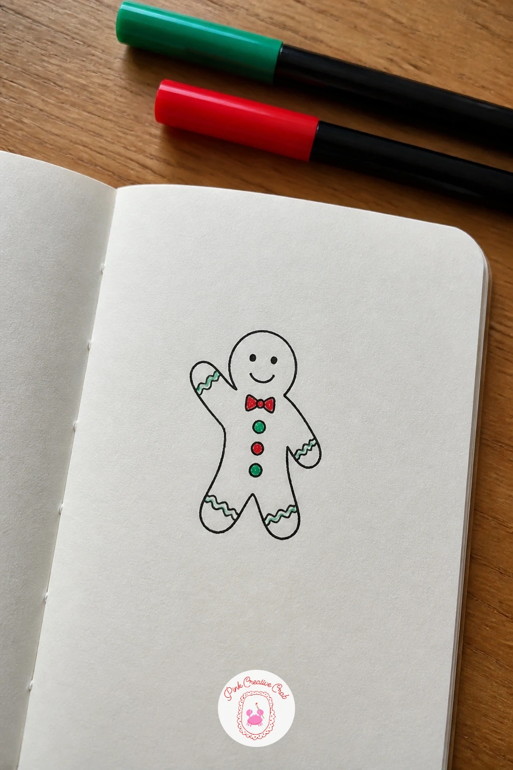 Gingerbread Man Waving — Move into characters with a gingerbread man waving, a shape most hands already know from childhood. Christmas card doodles