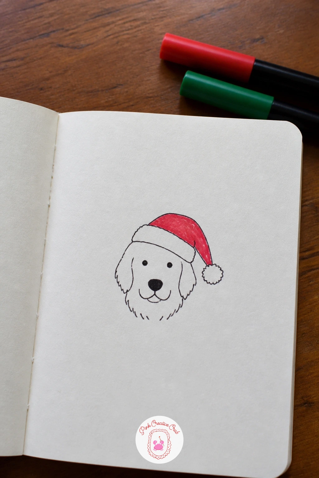 Dog In A Santa Hat — Give a pet a holiday touch with a dog in a Santa hat, an easy way to personalize a card for a dog-loving friend. Christmas card doodles