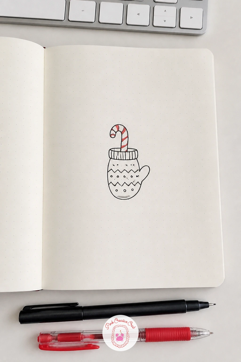 Mitten Holding A Candy Cane — After a character, settle into something calmer: a single mitten. Simple christmas doodles