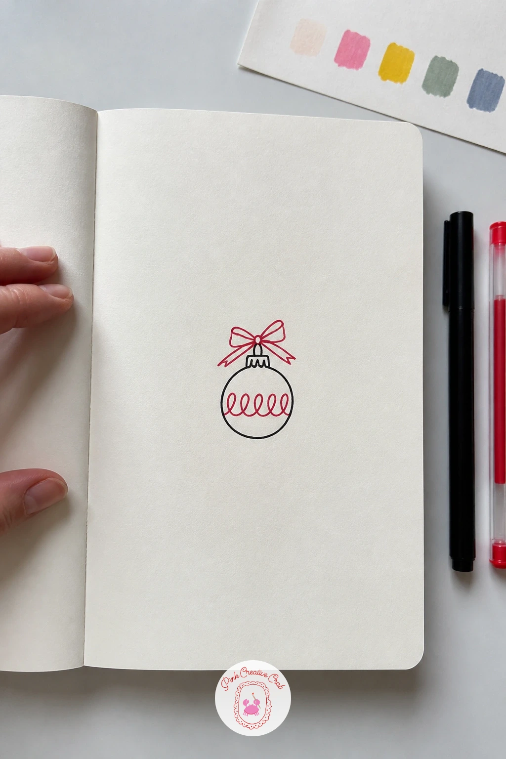 Bauble With A Bow — After a tree, draw one of its ornaments on its own, large enough to notice. Simple christmas doodles