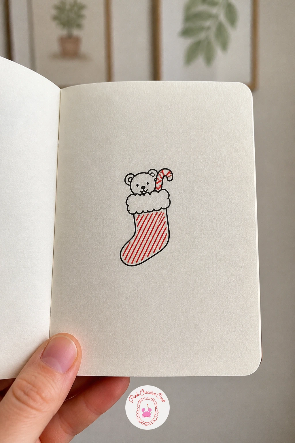 Stocking With A Toy — Shift from round shapes to a long one: the stocking. Simple christmas doodles
