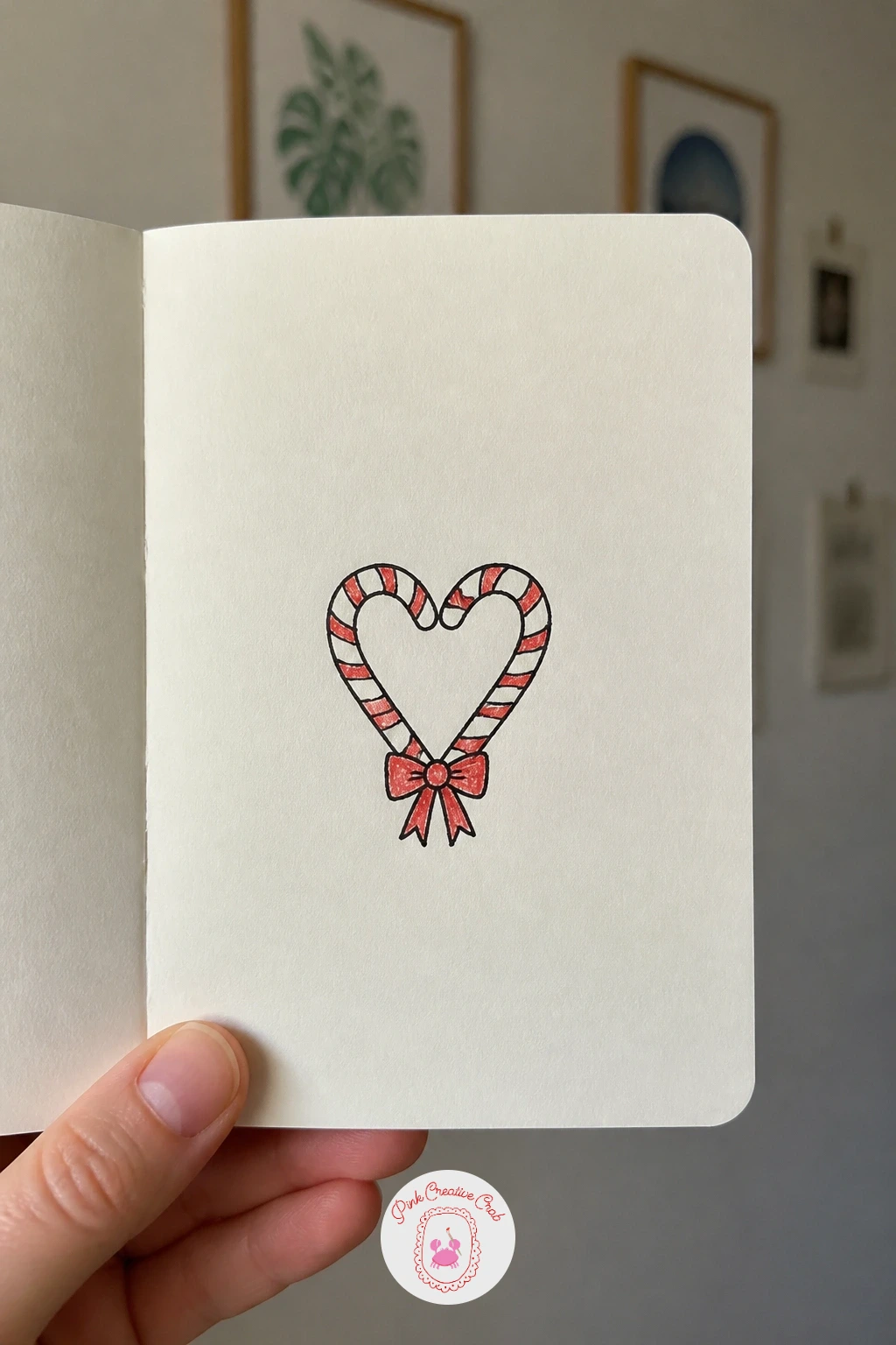 Candy Cane Heart — Bend the classic stripes into a new shape: two candy canes curved to form a heart. Simple christmas doodles
