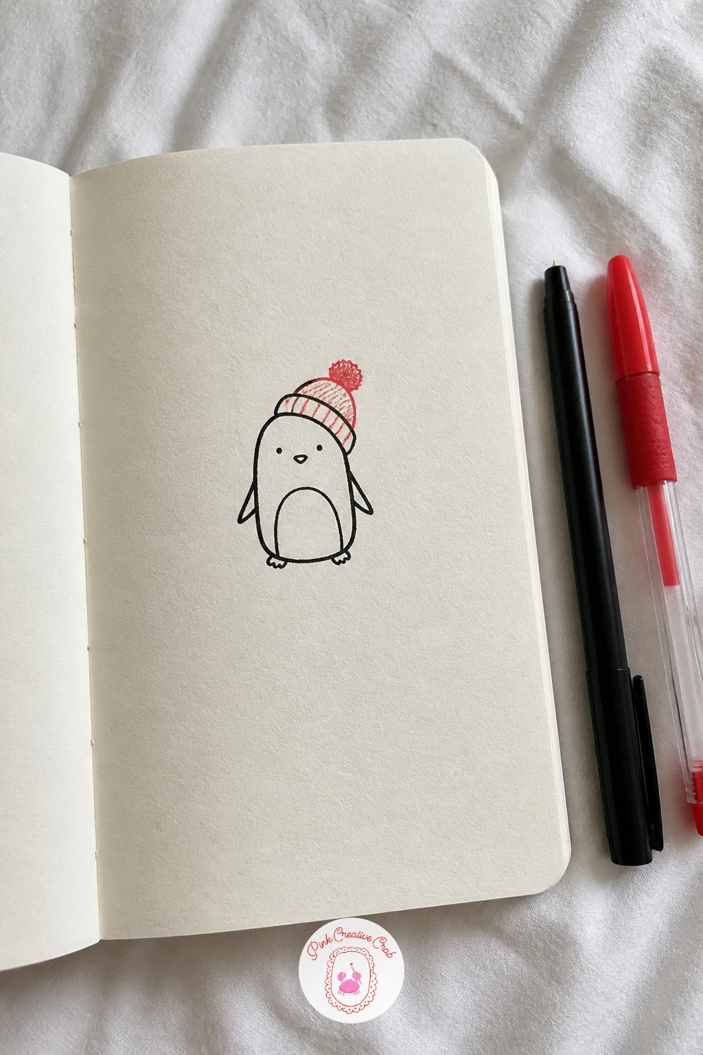 Penguin With A Hat — Keep the animal roster going with a penguin, built from one simple rounded teardrop body, wider at the bottom and narrowing at the head.