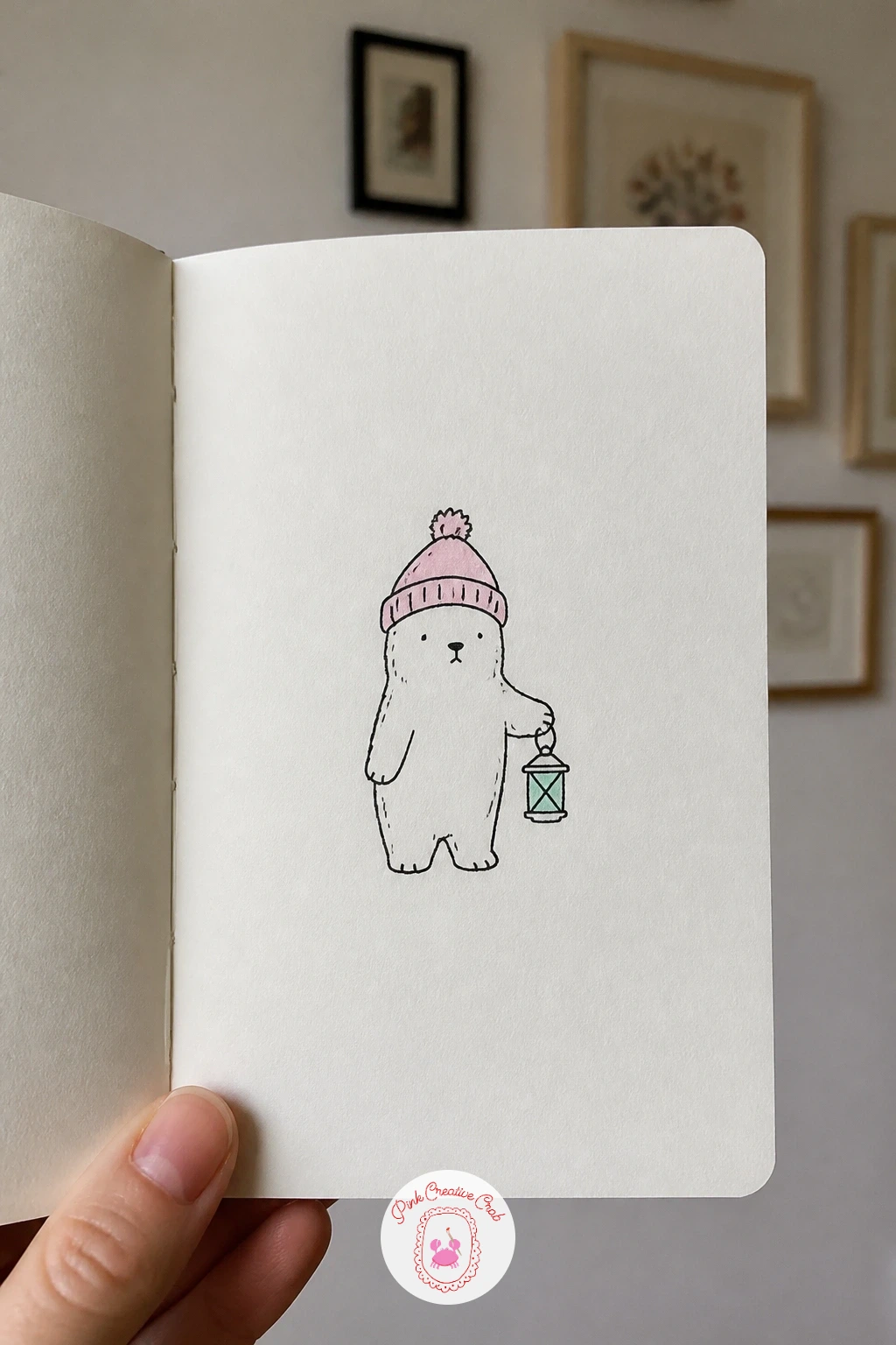 Bear in a Knitted Hat Carrying a Lantern — Bear in a Knitted Hat Carrying a Lantern builds on the polar bear's simple rounded body but adds a sense of a little