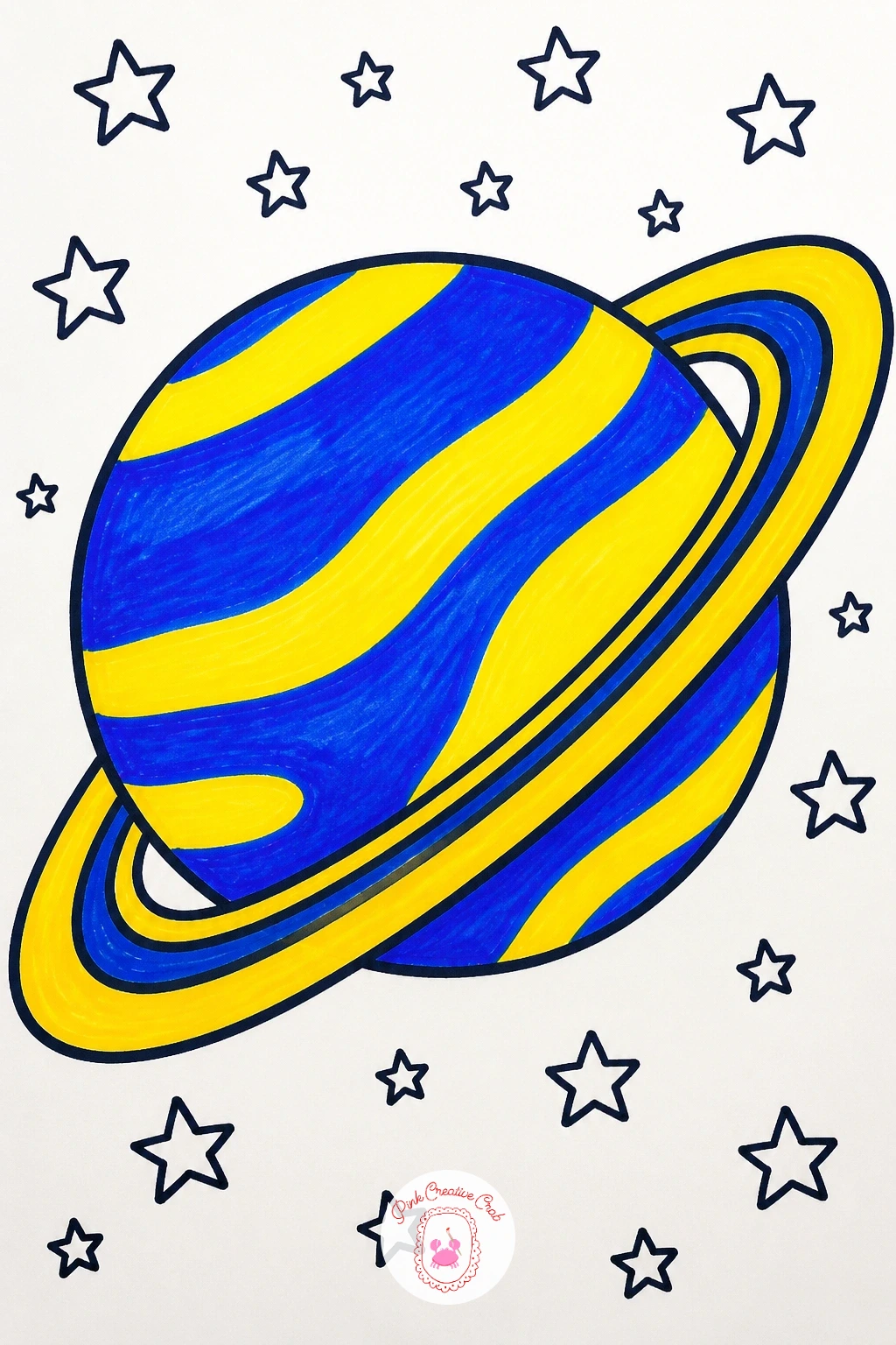 Planet and Stars — Leave the earth entirely for a ringed planet floating among scattered stars, a subject that is really just two overlapping circles and a lot
