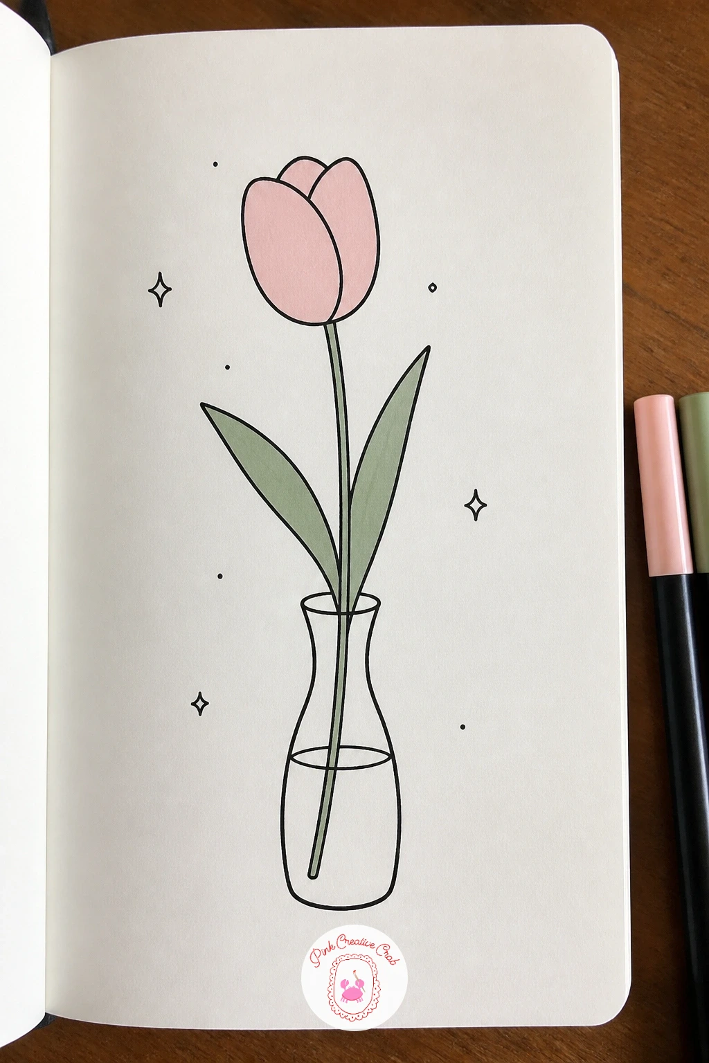 Tulip In A Tiny Vase — Move from a flat flower to one with a little volume: a tulip, which is really just a rounded triangle with a curved base. Flower doodles