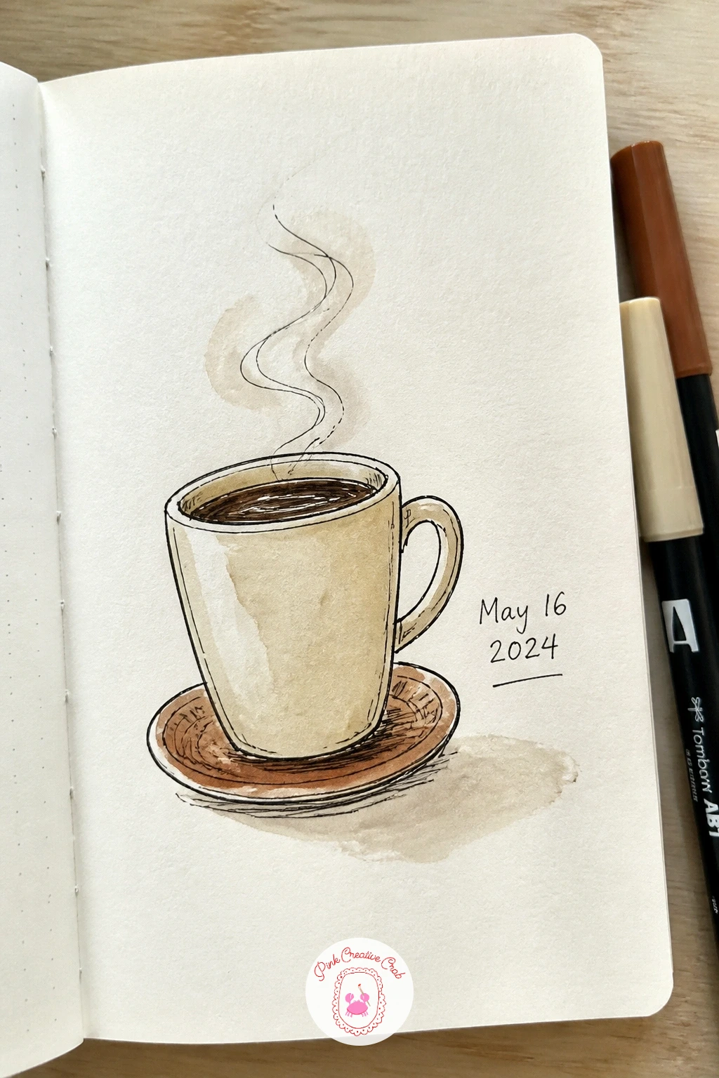 Coffee and the Date — Mark the actual day you began with a page of coffee and the date, a small diary-style entry rather than a big illustration. First page of