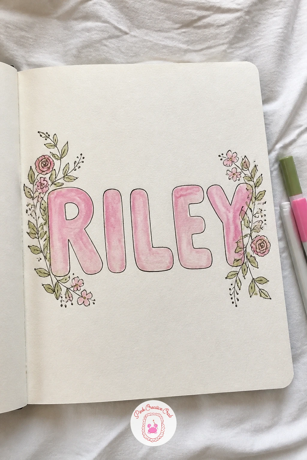 Name in Big Letters With Flowers — Letter your name in big letters and flowers for a page that feels like a signature piece early in the book. First page of