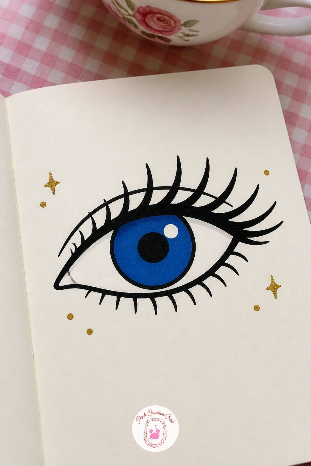 Eye With Lashes — Pair the lips with another graphic favorite: a single stylized eye with long curled lashes. Posca art doodle