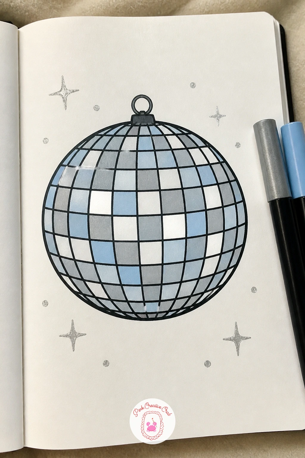 Disco Ball — Move from beach to dance floor with a round disco ball covered in small mirrored facets. Posca art doodle