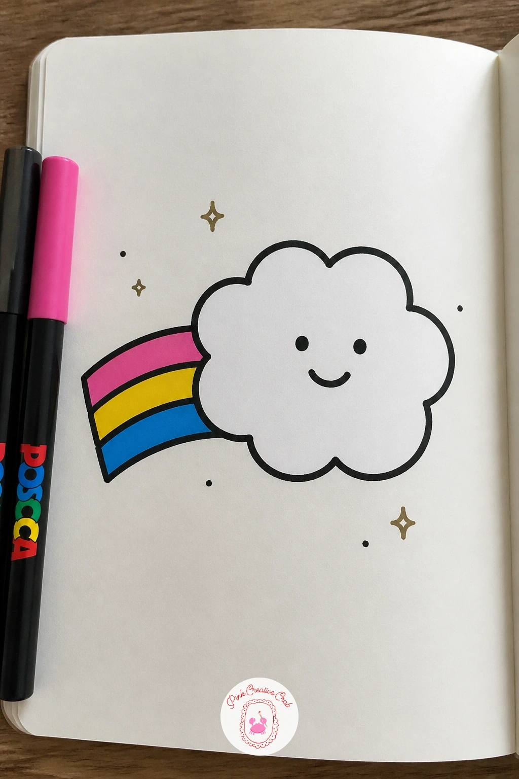Cloud With a Rainbow Tail — Take the rainbow and cloud pairing from earlier in a new direction: a single round cloud with a short rainbow trailing behind it
