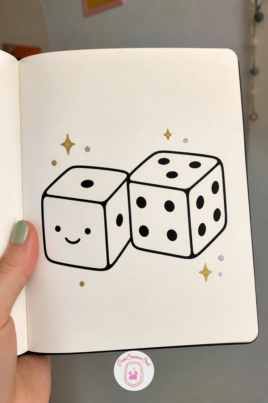 Smiling Dice Pair — Close out the list with two dice sitting side by side, each wearing a small smiling face among its dots. Posca art doodle