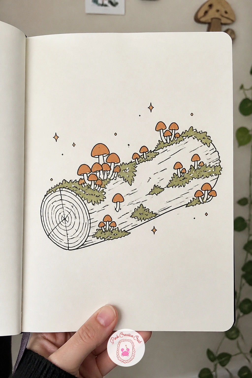 Log With Mushrooms — A log with mushrooms gives you a nice horizontal shape to practice alongside the rounder subjects you have drawn so far. Nature doodles