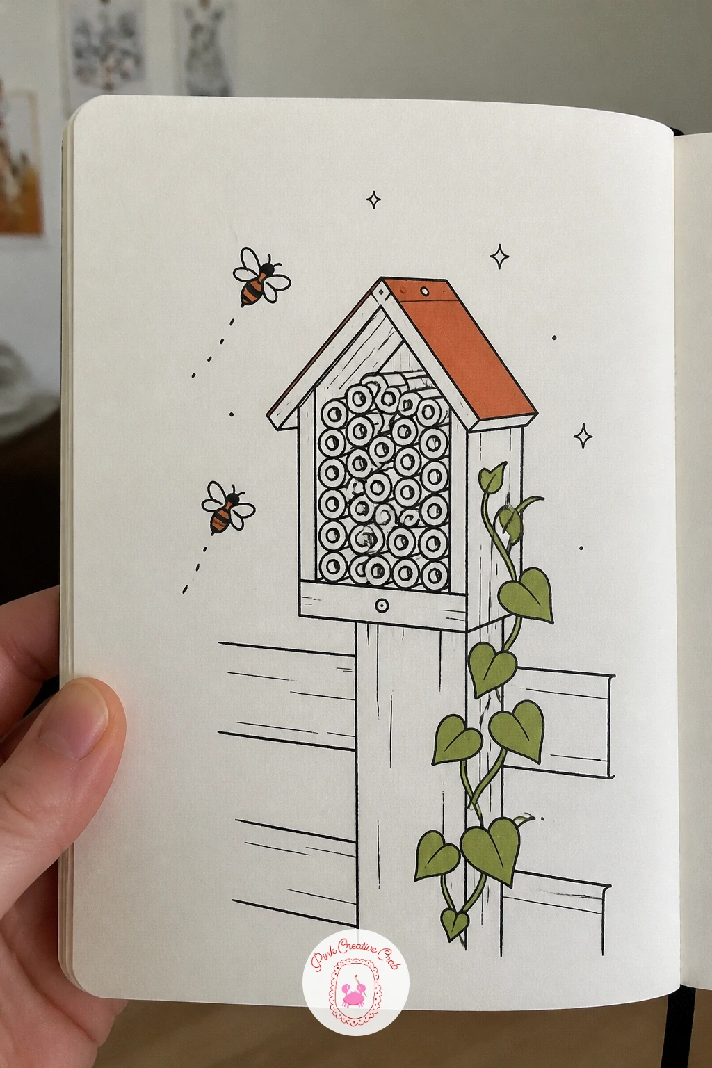 Bee Hotel on a Fence — Here the eye level sits close and straight on, since a bee hotel on a fence is really just a grid of little tubes viewed head on rather