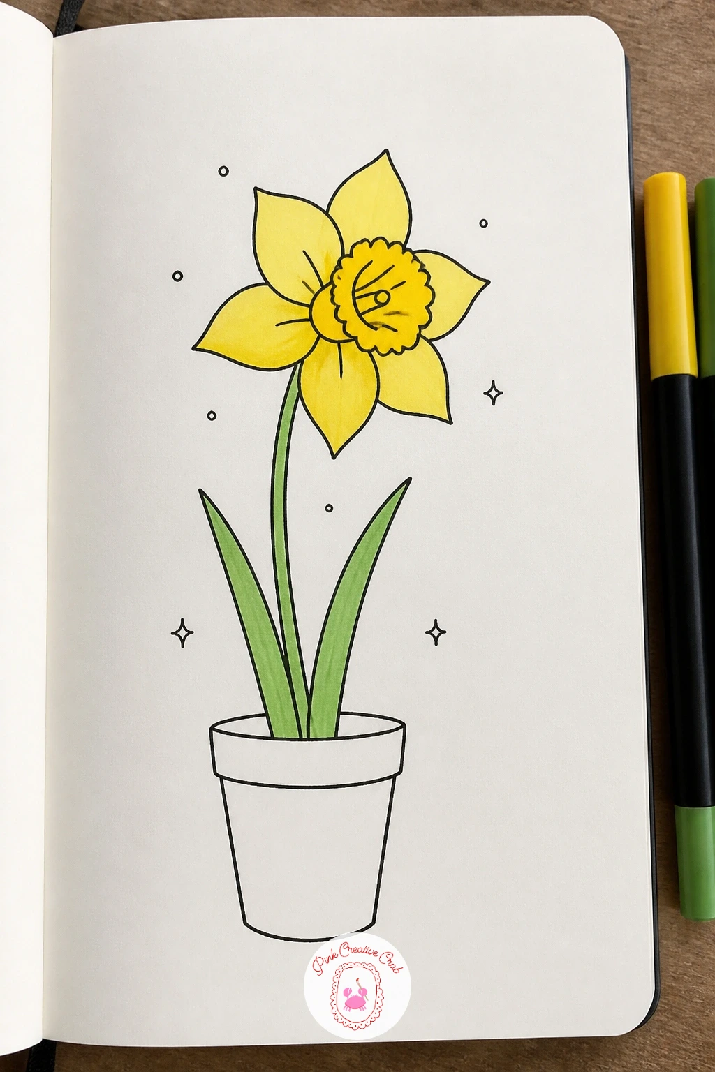 Daffodil Opening in a Pot — Start with the simplest shape in the whole set: a trumpet-shaped daffodil just beginning to unfurl from a small terracotta pot.