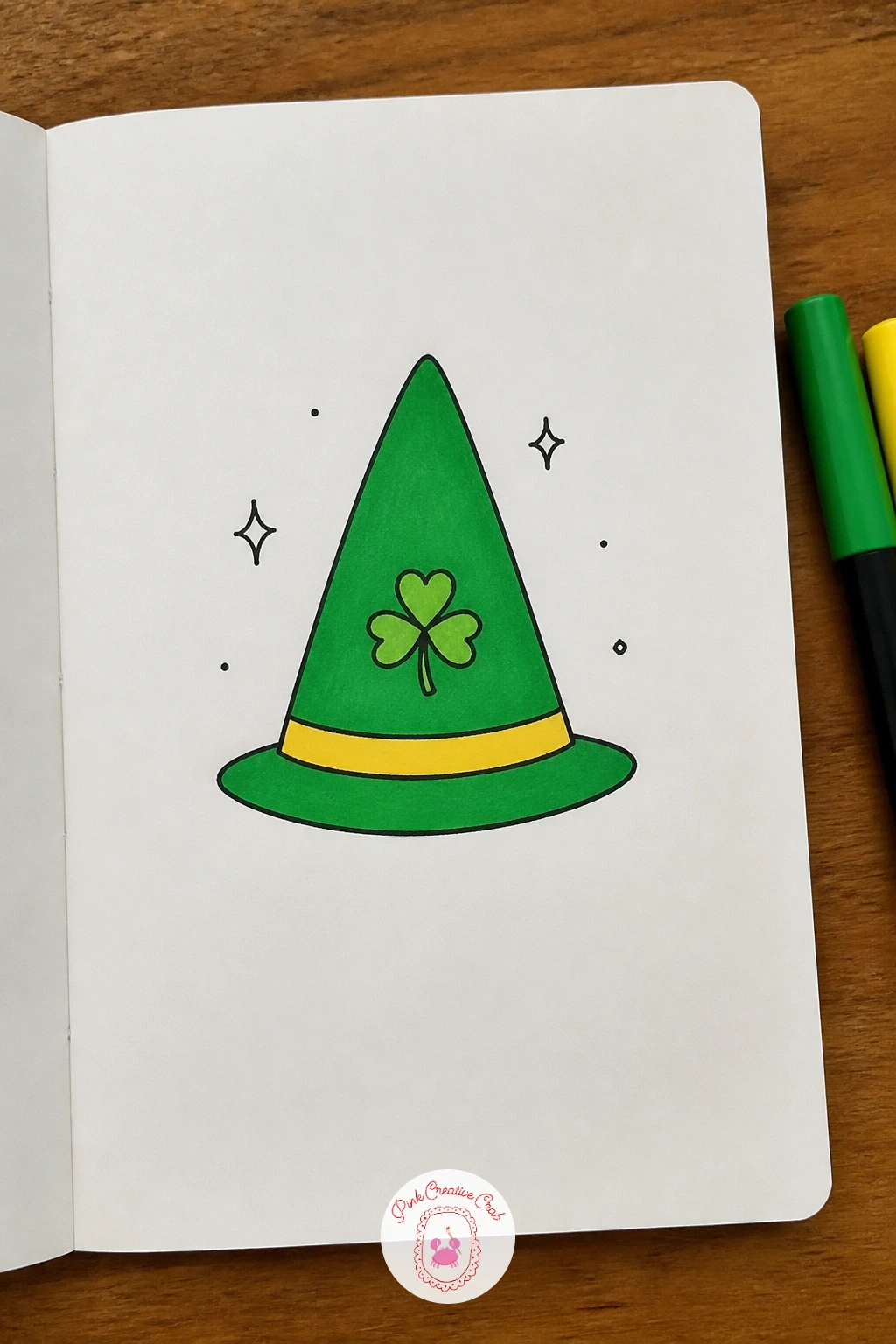 A Little Shamrock Hat — Switch to something wearable with a small pointed hat decorated with a single shamrock on the front brim. March doodles