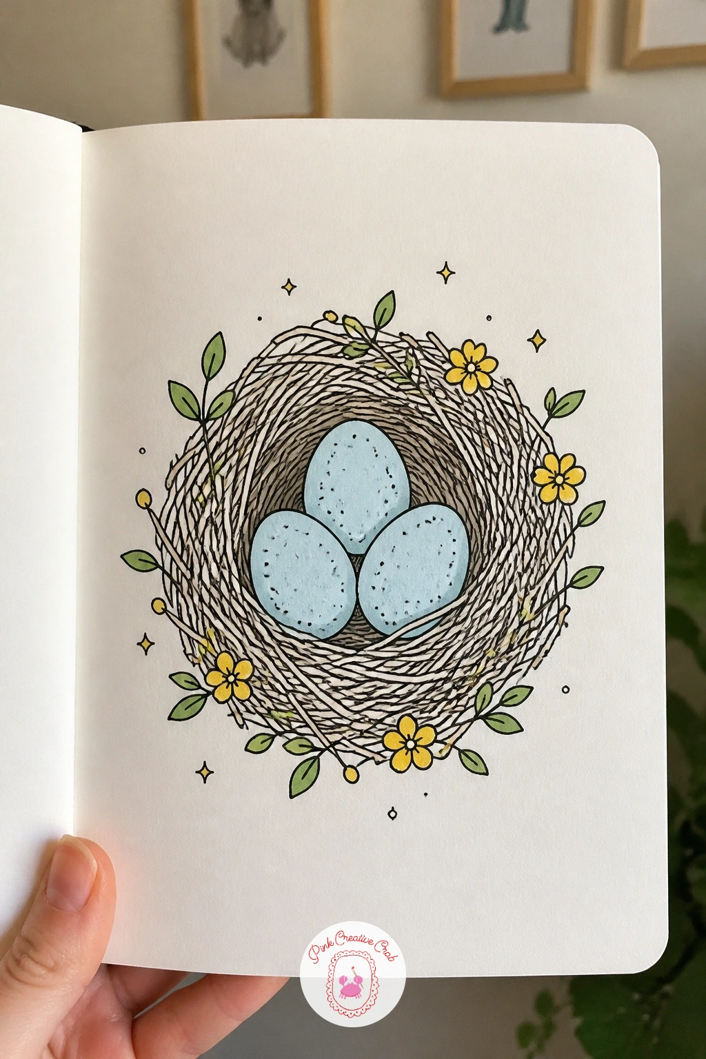 Nest With Blue Eggs — Settle the nest scene further with a close-up of the finished nest, now holding three small speckled blue eggs. March doodles