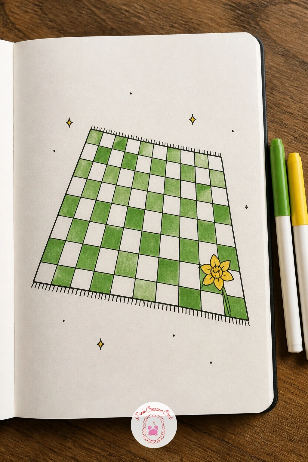 Picnic Blanket Waiting for Sunshine — Look ahead to warmer days with a simple checkered picnic blanket laid out and empty, waiting for the first proper sunny