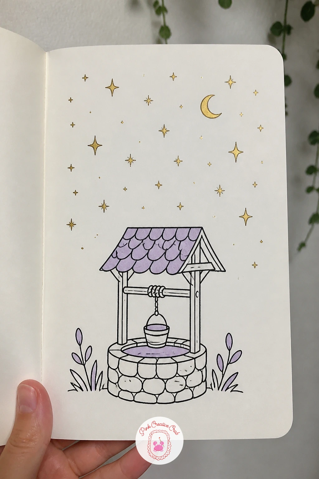 Wishing Well Under Stars — Build a small scene with real depth for this one. Celestial doodles