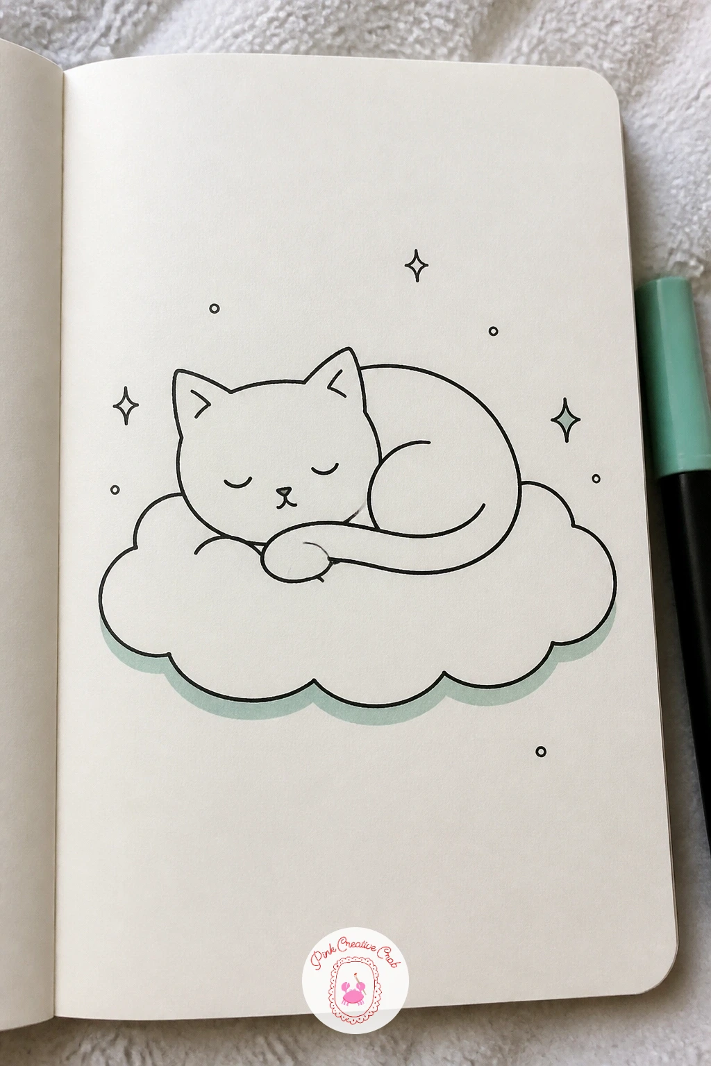 Cat On A Cloud — Return to a floating character with a small cat napping on a cloud, pairing two shapes you have each drawn separately earlier in this list.
