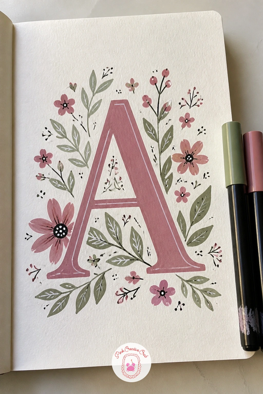Flowers and Initials Monogram — Flowers and your initials make the gentlest cover to start with, because the layout is just one big letter with blooms tucked