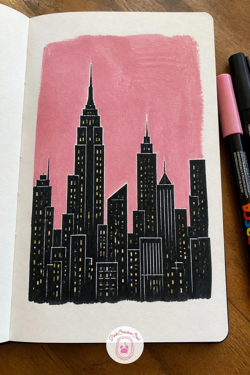 City Skyline Cover — A city skyline sits low across the cover as a row of simple building silhouettes, which makes it an easy composition even though it looks