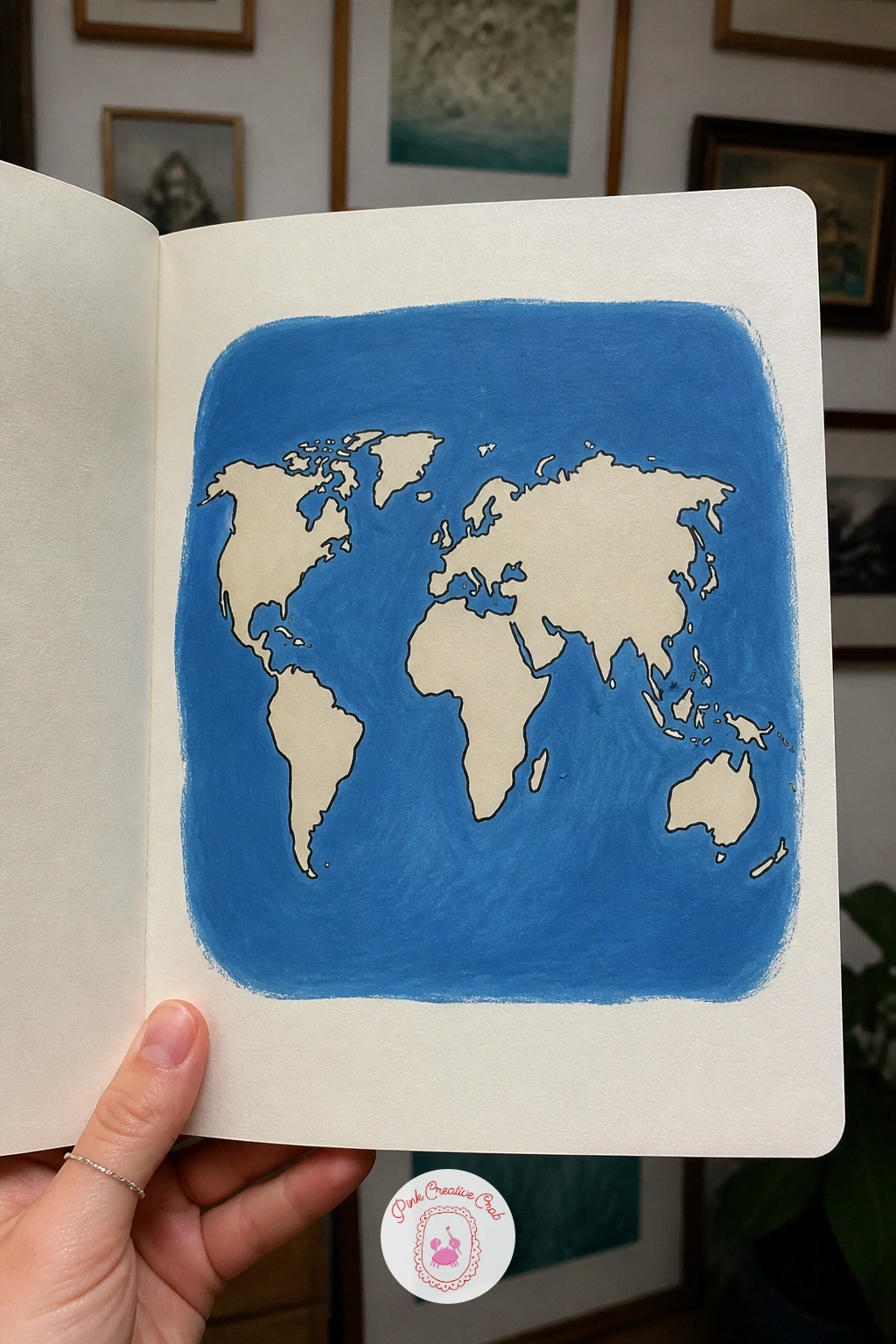 World Map Cover — A world map cover simplifies the continents into soft rounded shapes rather than exact geography, which keeps the whole thing approachable