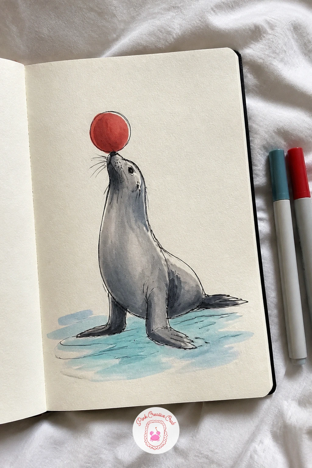 Sea Lion Balancing a Ball — Bring some comedy back with a sea lion balanced on its flippers, nose tipped up with a ball resting right on the tip. Things to