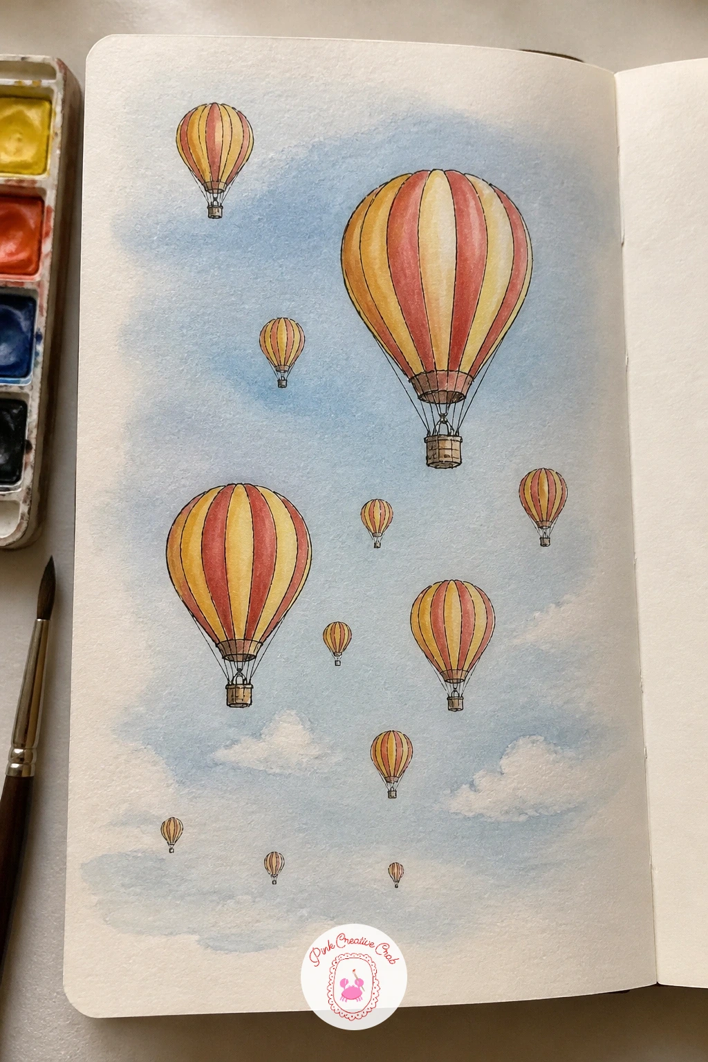 Sky Full Of Hot Air Balloons — Scatter balloons of varying size across the whole spread rather than lining them up evenly, with the biggest one or two nearest