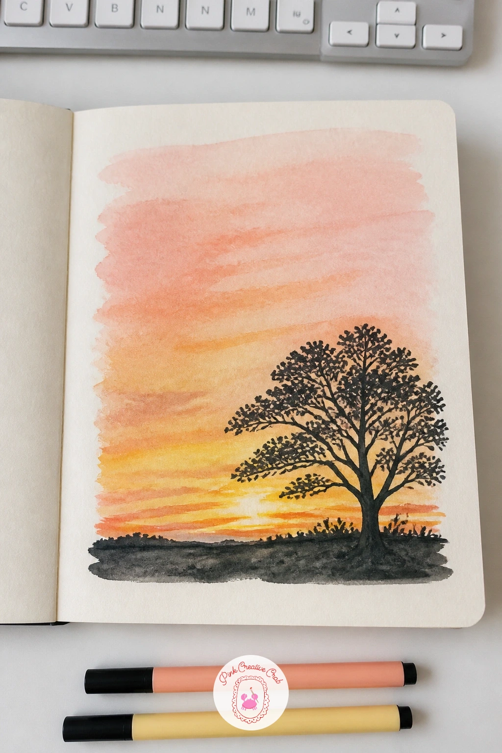 Sunset Silhouette Tree — Mix up three puddles of color before you touch the page: butter yellow, soft peach and a dusty pink, then lay them in horizontal bands