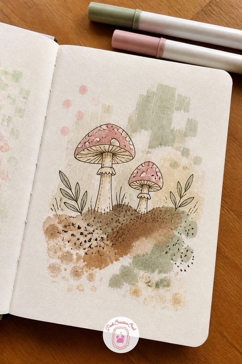 Sponge Texture Mushrooms — Tear a small natural sponge or crumple a piece of plastic wrap, dab it into a muted brown or sage watercolor, then press it across