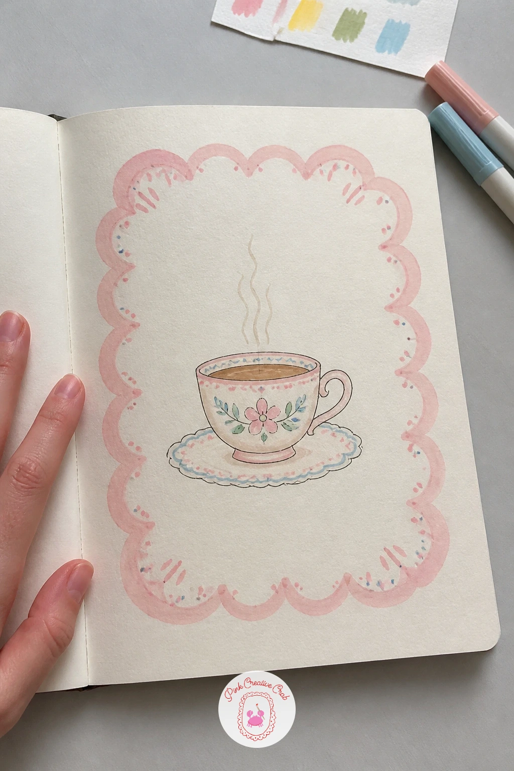 Scalloped Frame Teacup — Draw a loose scalloped border around the edge of the page, a row of small connected half circles, using a coin or bottle cap as a
