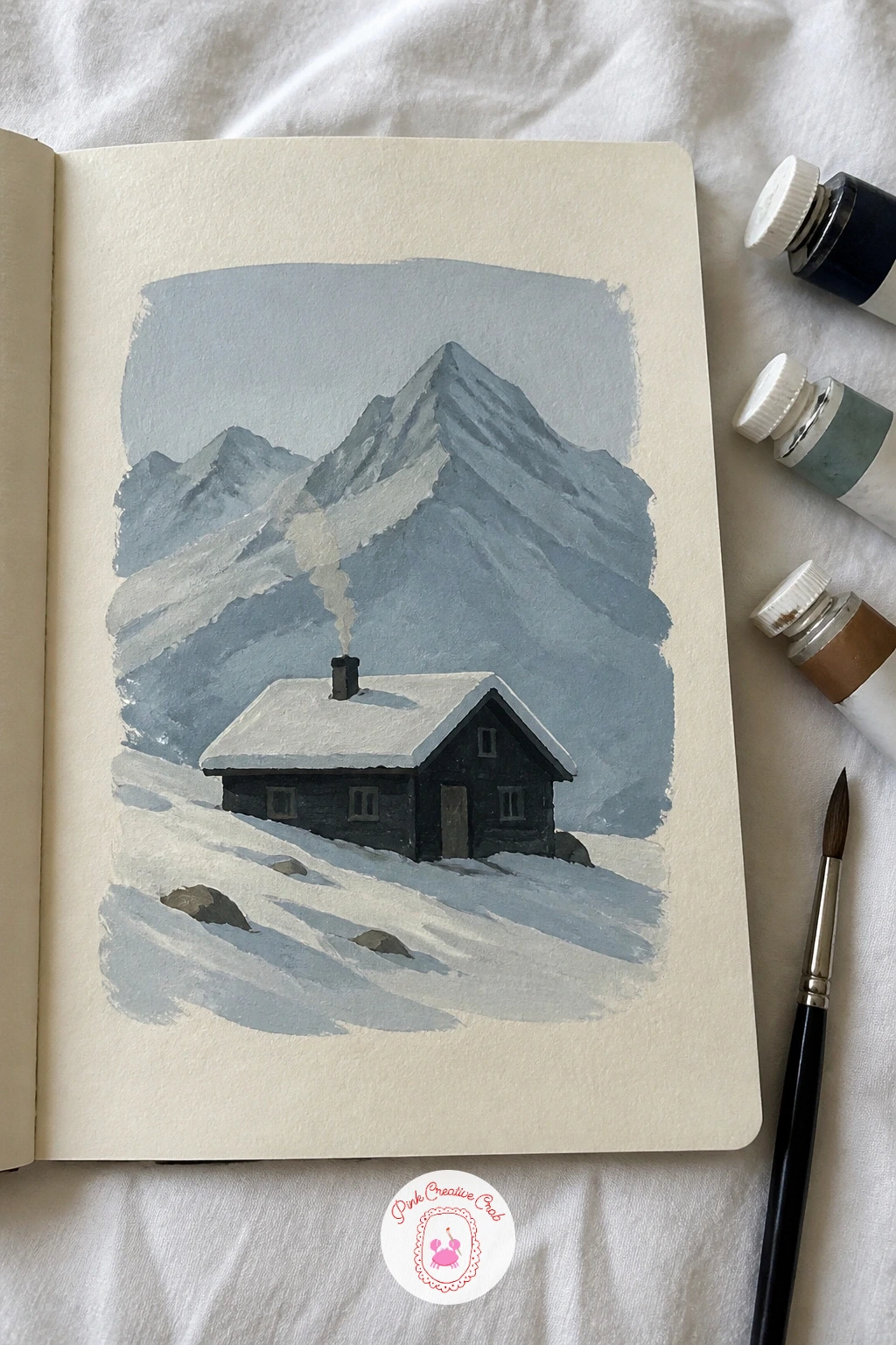 Snowy Mountain Hut — Carry that same careful light logic into a snowy mountain hut, small and solitary against white slopes. Gouache sketchbook