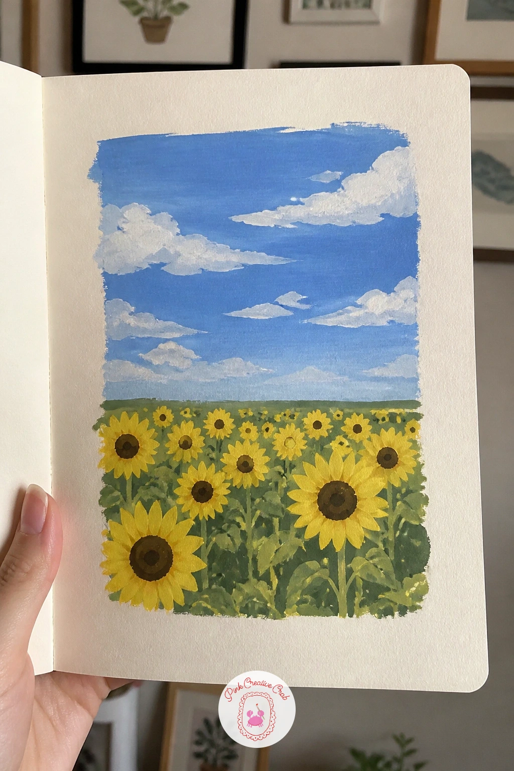 Field Of Sunflowers Under A Blue Sky — Close out the floral side of the sketchbook with a field of sunflowers under a blue sky, big simple shapes that paint up