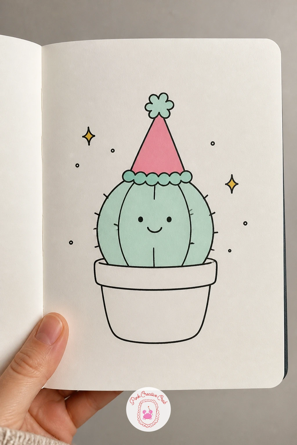 Cactus Wearing A Party Hat — Start the page with a cactus wearing a party hat, since round cactus shapes are the gentlest way into mini doodles