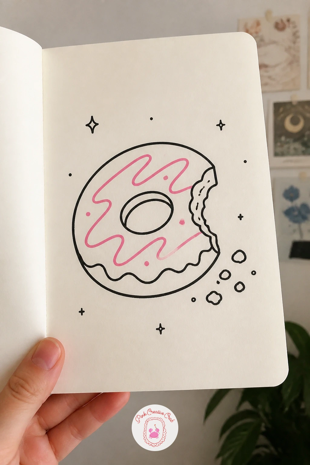 Donut With A Bite And Crumbs — Add a little visual story with a donut that has a bite taken out, crumbs scattered beside it. Mini doodle