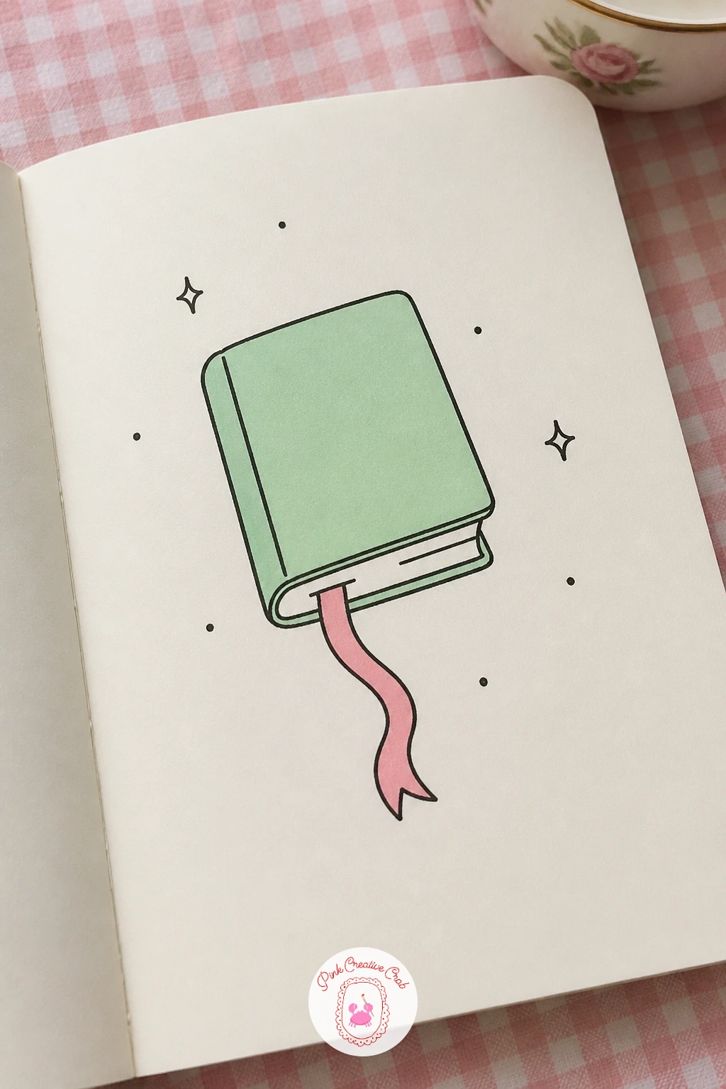 Tiny Book With A Ribbon Bookmark Tail — Slow down with a tiny book that has a ribbon bookmark trailing out like a tail, a doodle built mostly from straight and