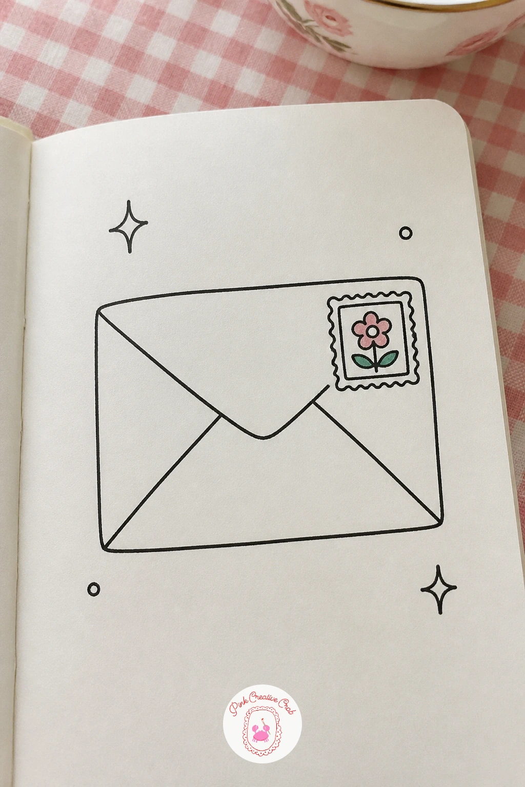 Envelope With A Flower Stamp — Give the page a little correspondence with an envelope that has a flower stamp in the corner. Mini doodle