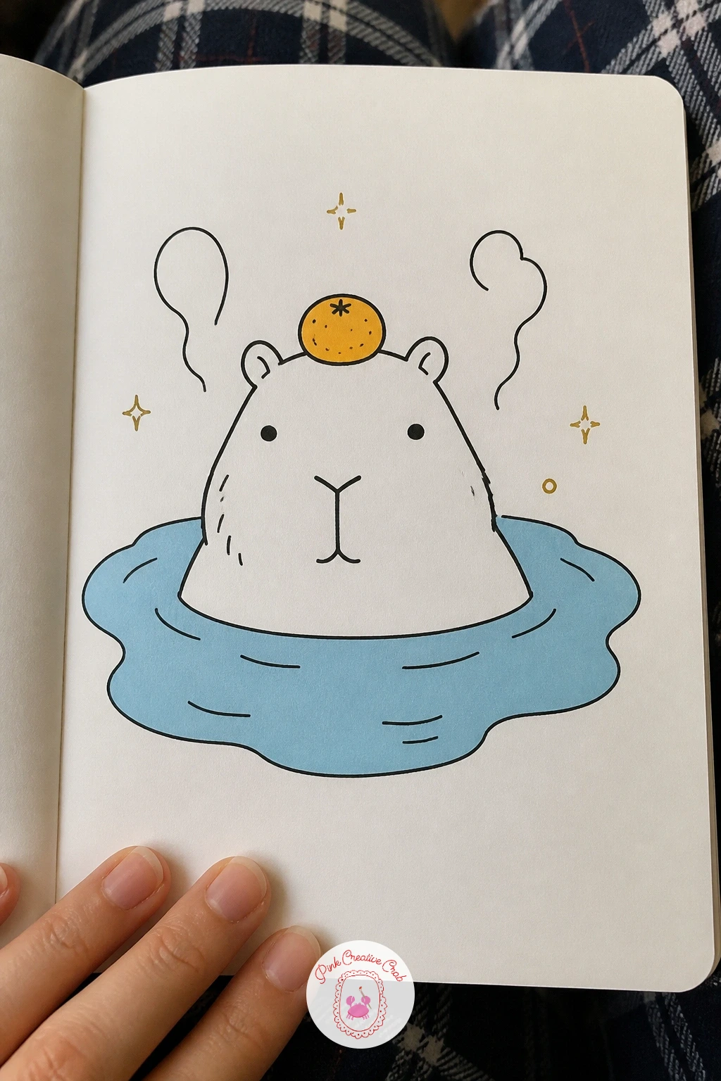 Capybara in a Hot Spring With a Yuzu on Its Head — This is the signature capybara pose, so take a moment with proportion before inking: the body should sit low