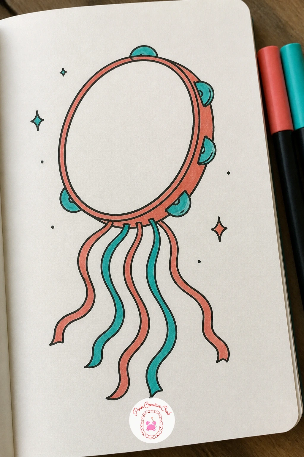 Tambourine With Streamers — A tambourine with streamers trailing off one edge brings some movement into a fairly flat round object. Music doodle
