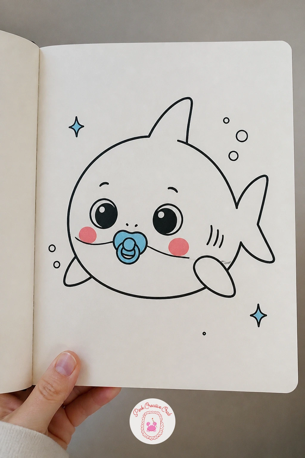 Baby Shark With A Tiny Pacifier — Shrink the shark right down for a baby shark with a tiny pacifier, rounder and softer than any shark so far. Shark doodle