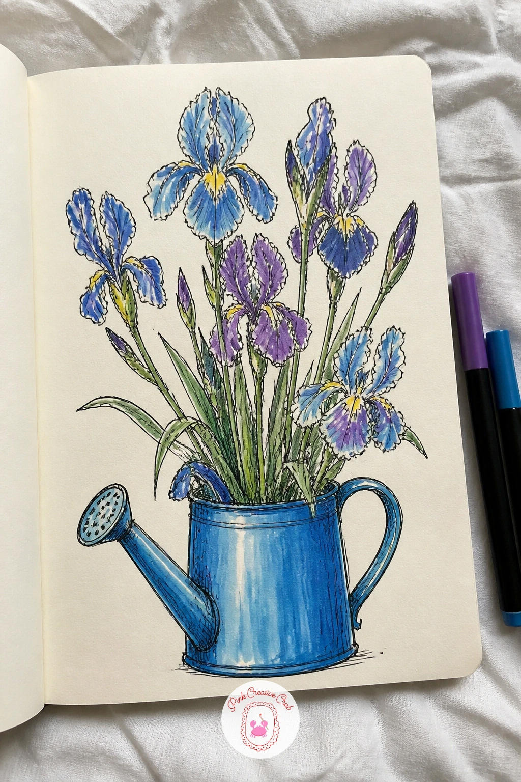 Van Gogh's Irises in a Blue Watering Can — Close the sketchbook on Van Gogh's irises, but stand them in a blue watering can instead of a vase, since the curved