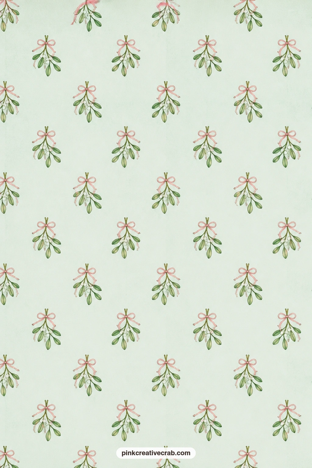 Mistletoe and Ribbon Paper printable page — Small mistletoe sprigs tied with ribbon on pale mint line a gift envelope neatly, and the soft green keeps the