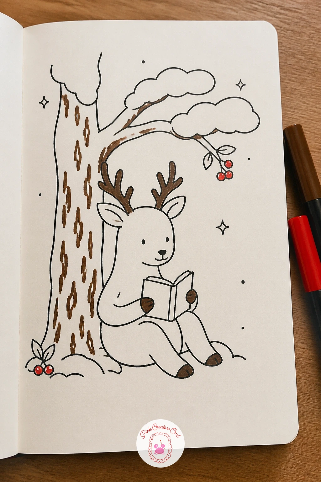 Deer Reading Under A Snowy Tree — Settle a deer down with its back against a tree trunk, a small open book held between its front hooves. Deer doodle