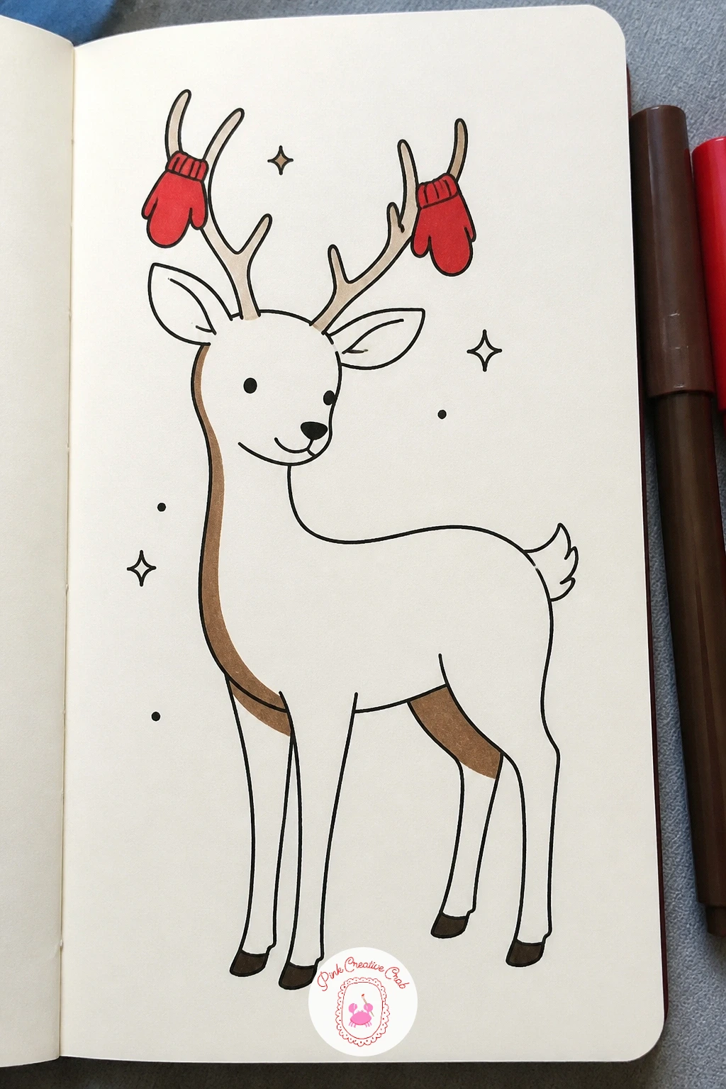 Deer Drying Mittens On Its Antlers — Hang a pair of small mittens from a deer's antler branches, as if drying them after a walk in the snow. Deer doodle